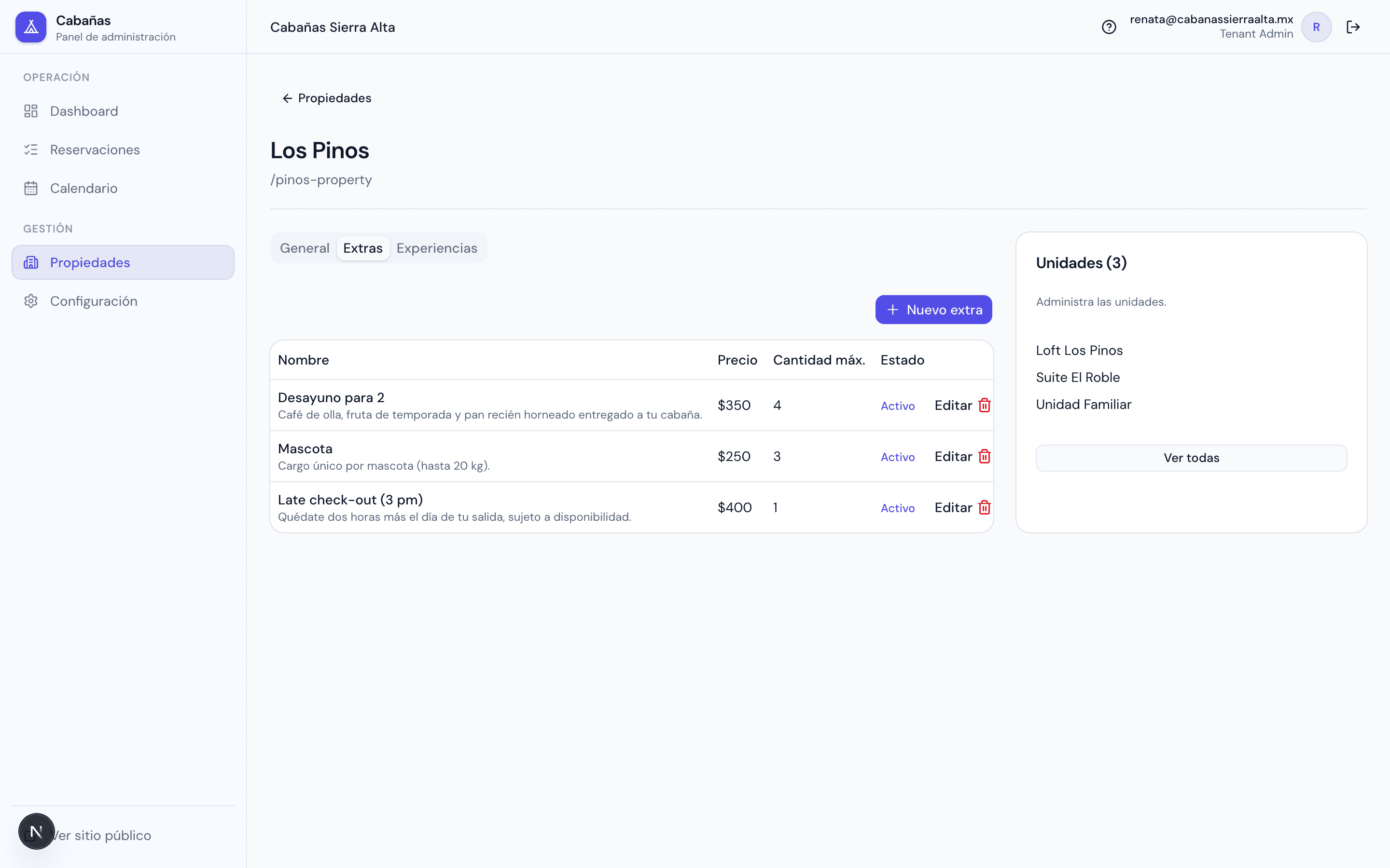 Editor de propiedad — tab Extras: add-ons de pago por propiedad.